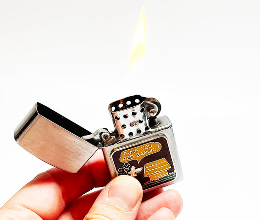 1960s Snoopy "Fuck You Red Baron" Vietnam Era Flip Top Lighter