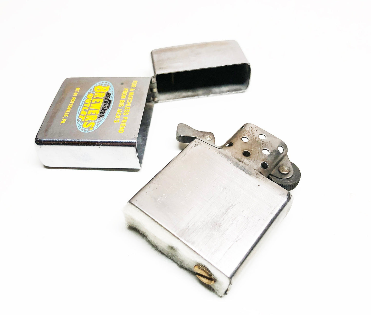 1976 Brewer's Outlet Advertising Zippo Lighter