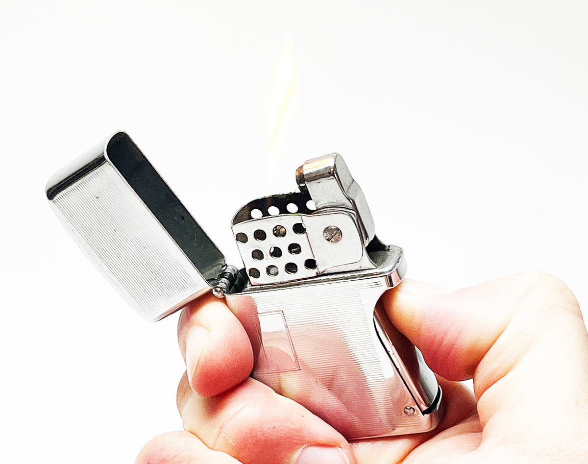 1950s Hilton Storm Master Squeeze Style Flip Top Automatic Lighter