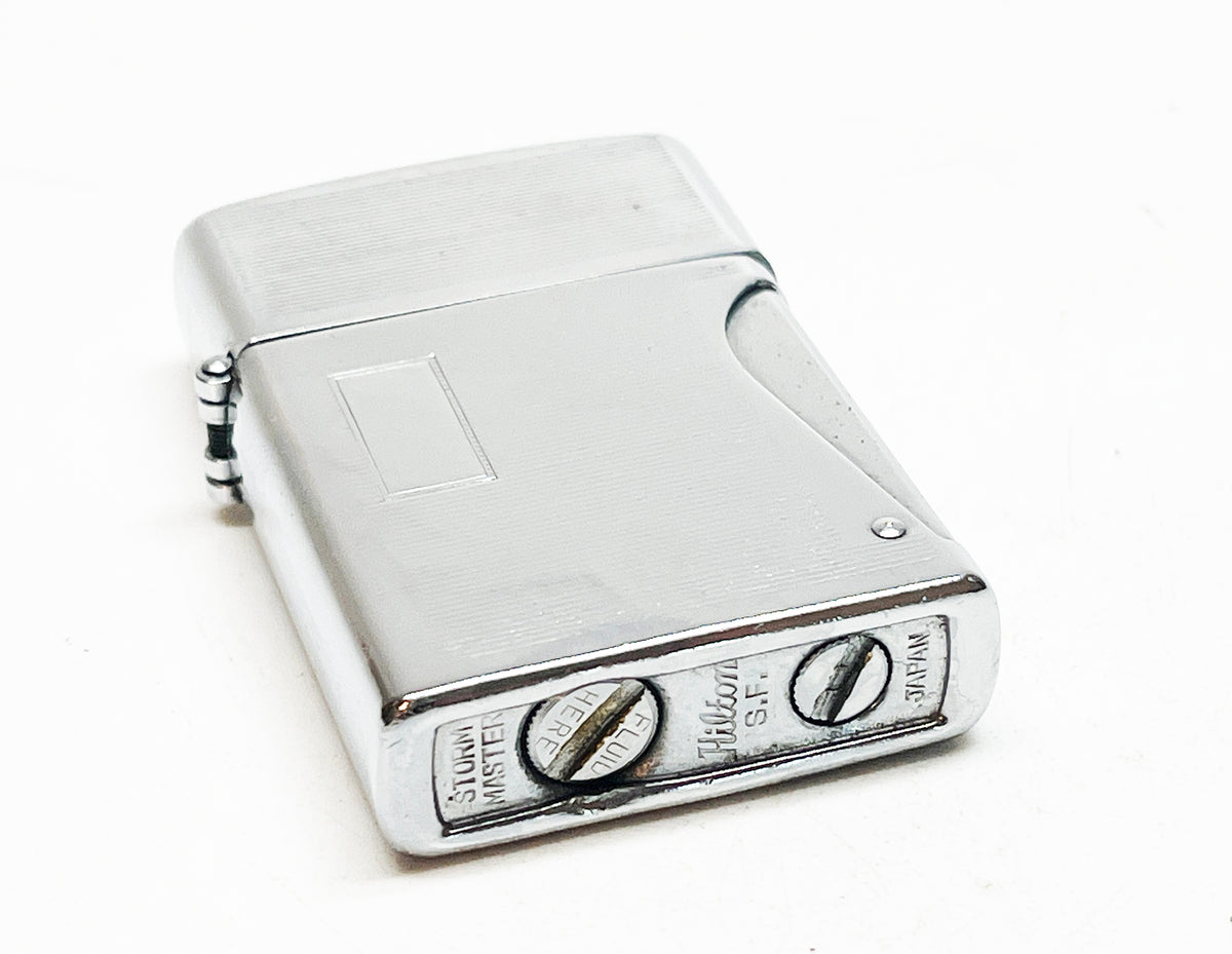 1950s Hilton Storm Master Squeeze Style Flip Top Automatic Lighter