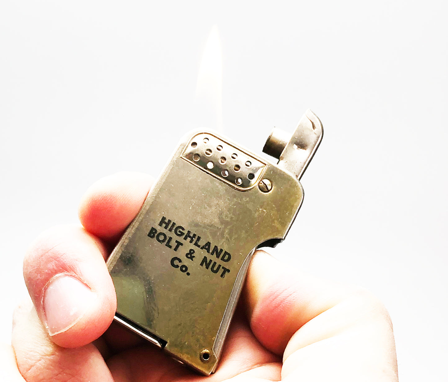 1930s Econolite "Highland Bowl & Nut Co." Advertising Squeeze Lighter