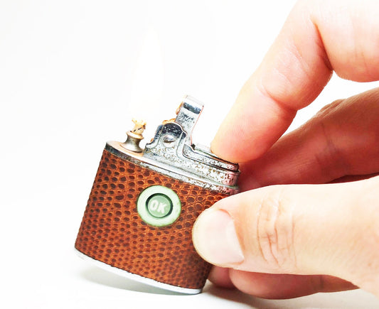 Rare Hilton Fluid Eye Lighter