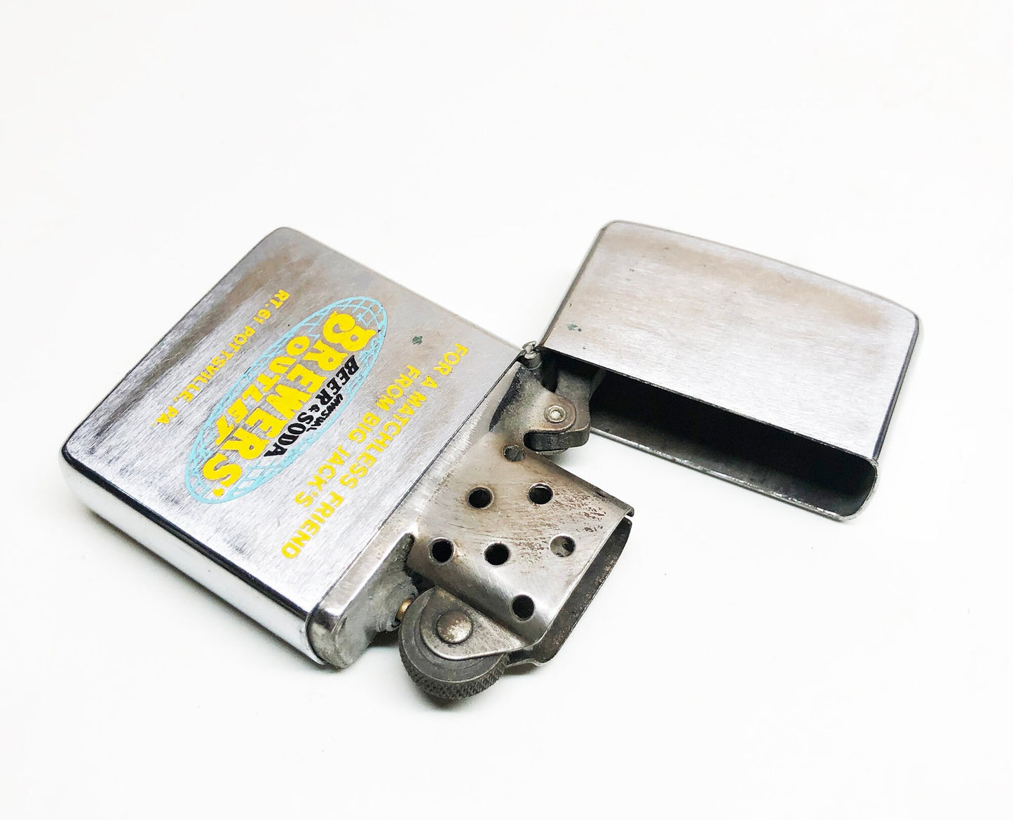 1976 Brewer's Outlet Advertising Zippo Lighter