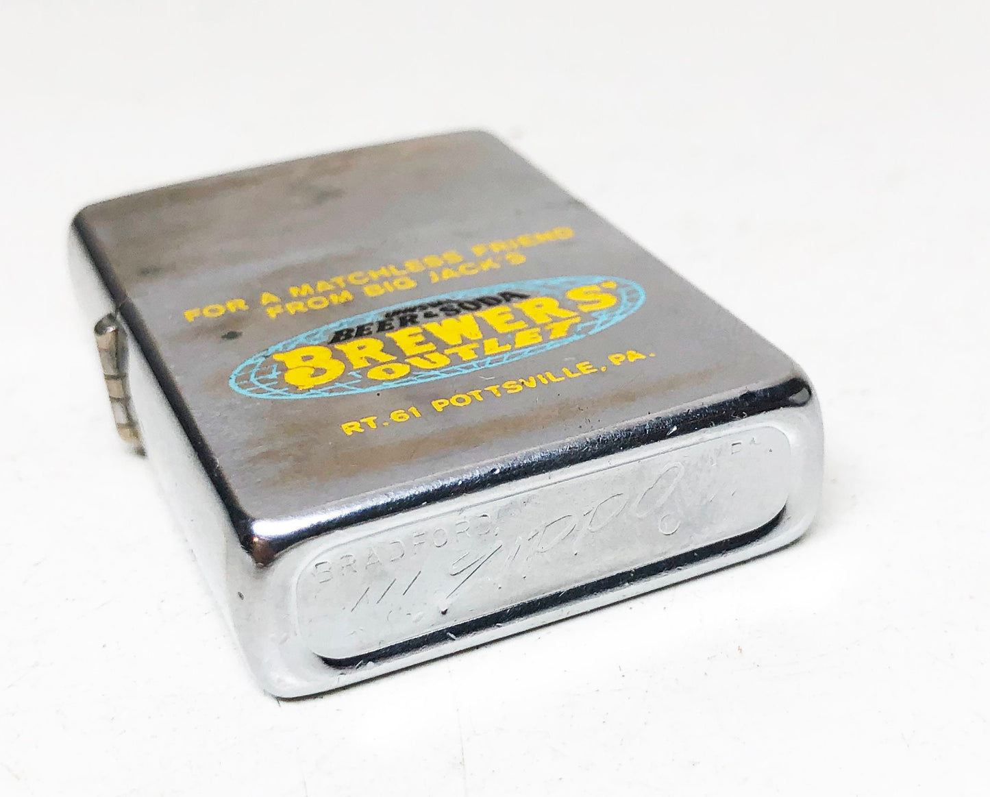 1976 Brewer's Outlet Advertising Zippo Lighter